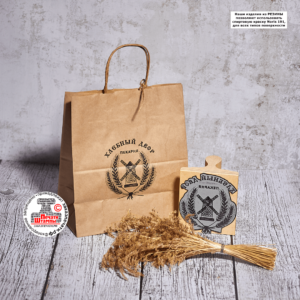 Брендирование крафтовых пакетов и картонных коробок с помощью штампа