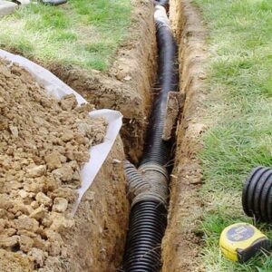 Почему нужен монтаж дренажной системы на участке?